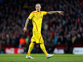 Liverpool defender Martin Skrtel gestures whilst in action for his side in the English Premier League