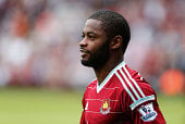 Alex Song looks on whilst he is in action for West Ham