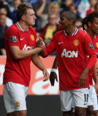 Defender Phil Jones and winger Ashley Young celebrate Manchester United's goal