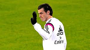 Real Madrid attacker Gareth Bale waves to his supporters