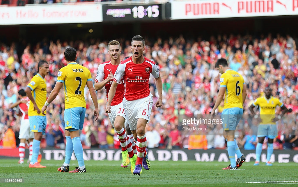 Defender Laurent Koscielny of Arsenal celebrates