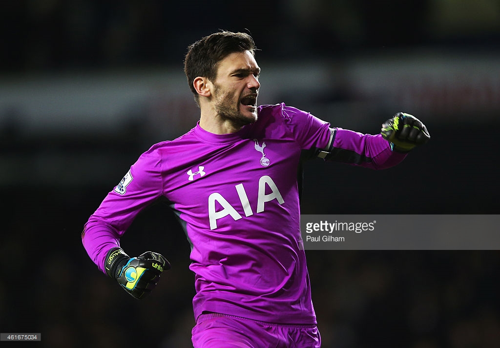 Goalkeeper Hugo Lloris punches the air in delight for Tottenham