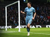 James Milner celebrates after scoring for Manchester City