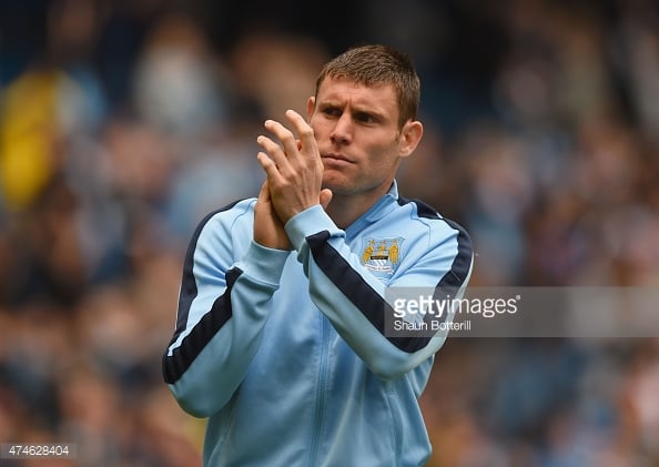 Midfielder James Milner at Manchester City applauding the crowd