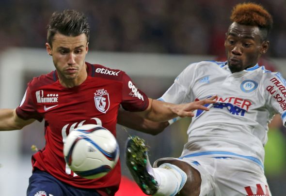 Sebastian Corchia watches the ball closely for his French side Lille