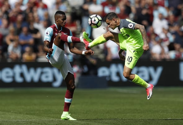 Philippe Coutinho controls the ball for his English Premier League side Liverpool