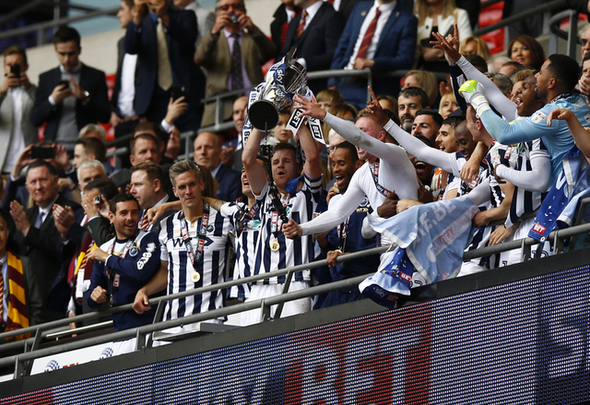 Millwall Football Club celebrate winning promotion to the Championship