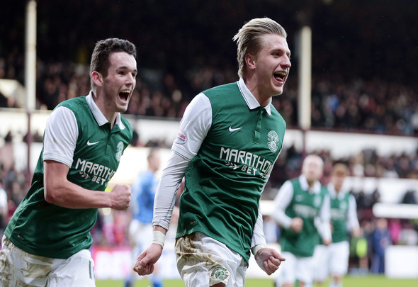 Jason Cummings of Hibernian celebrates scoring a goal