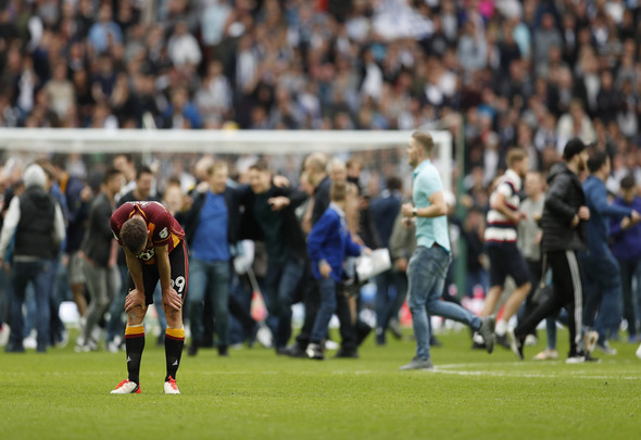 Tony McMahon of Bradford City looks dejected after his side lost the SkyBet League One play-off final
