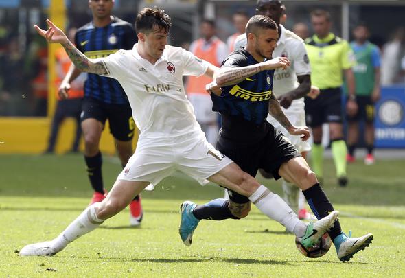 Alessio Romagnoli of AC Milan makes a tackle