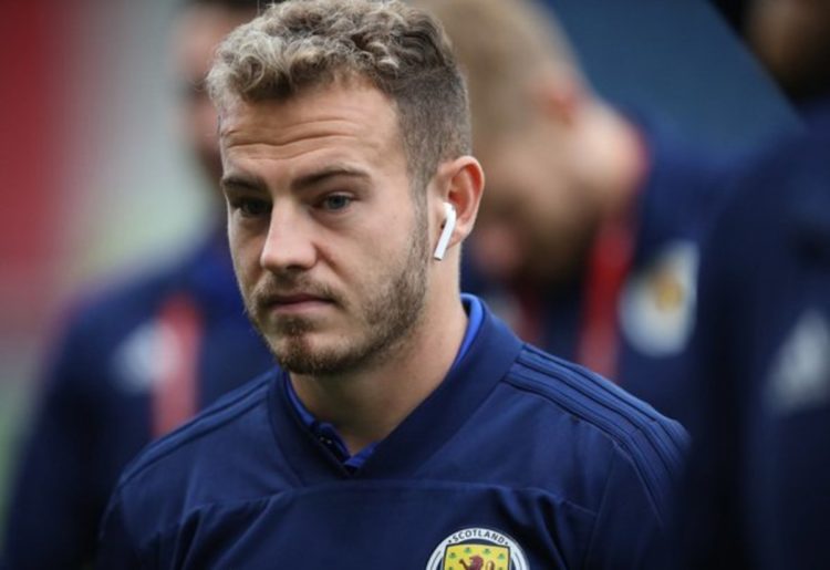 Newcastle Ryan Fraser Scotland shirt wearing airpods
