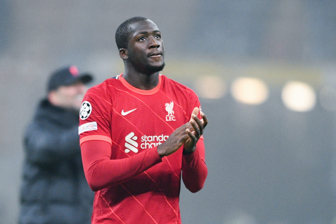 Liverpool defender Ibrahima Konate clapping the supporters after a match.