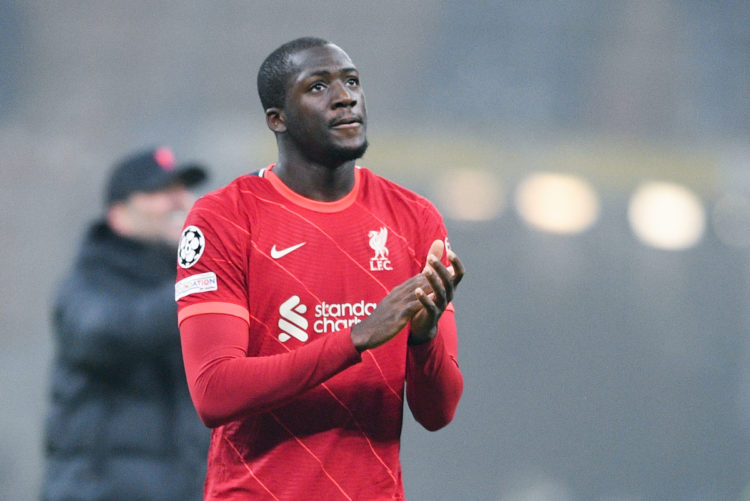 Liverpool defender Ibrahima Konate clapping the supporters after a match.