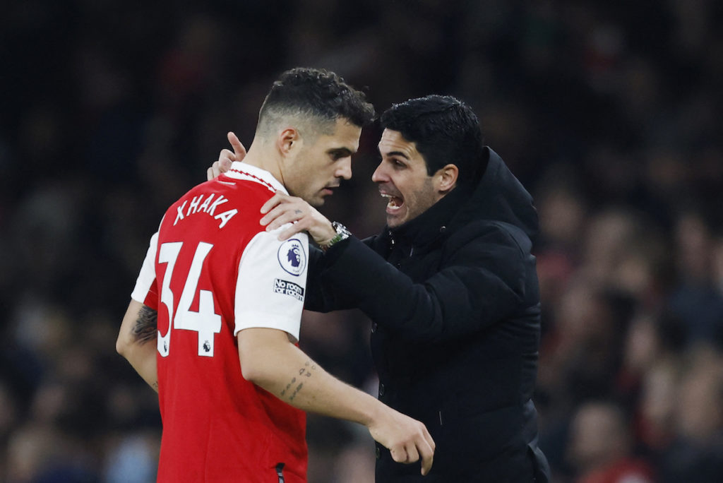 Arteta having an animated chat with Granit Xhaka on the sidelines.