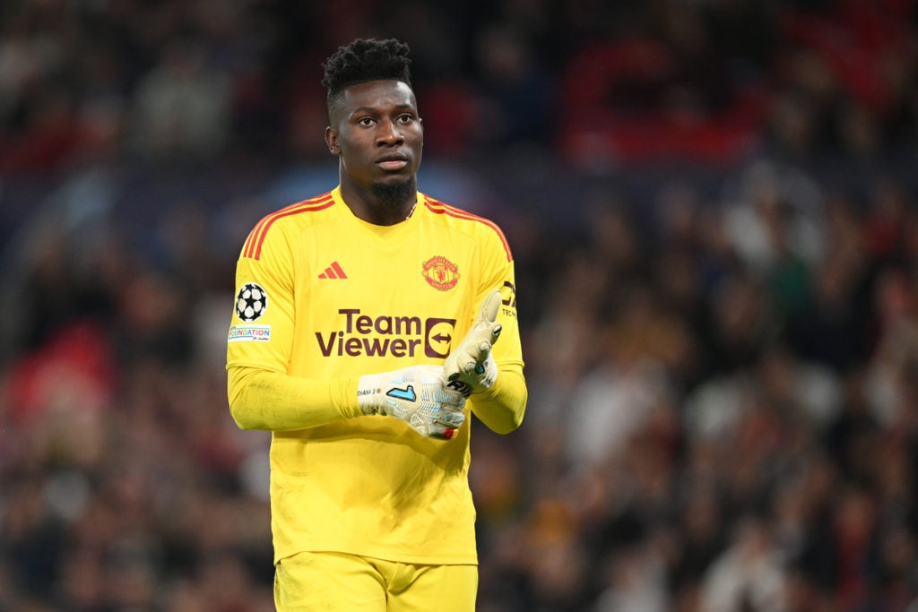 Andre Onana adjusting his gloves at Old Trafford
