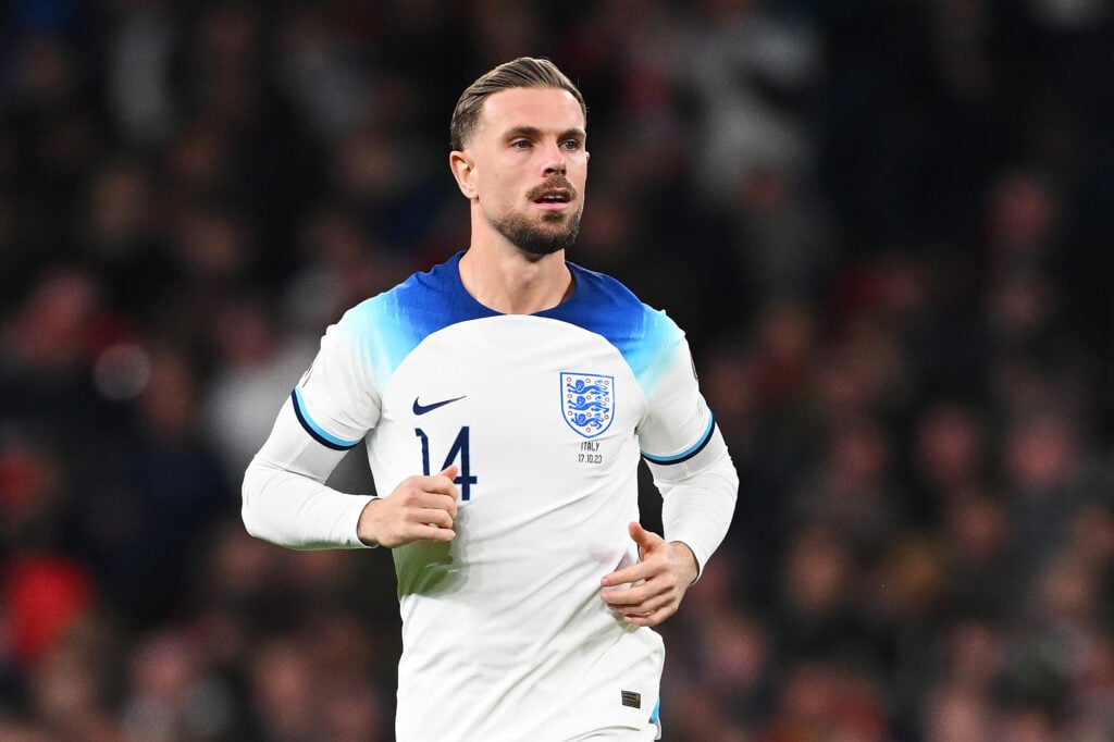 Jordan Henderson running in an England shirt