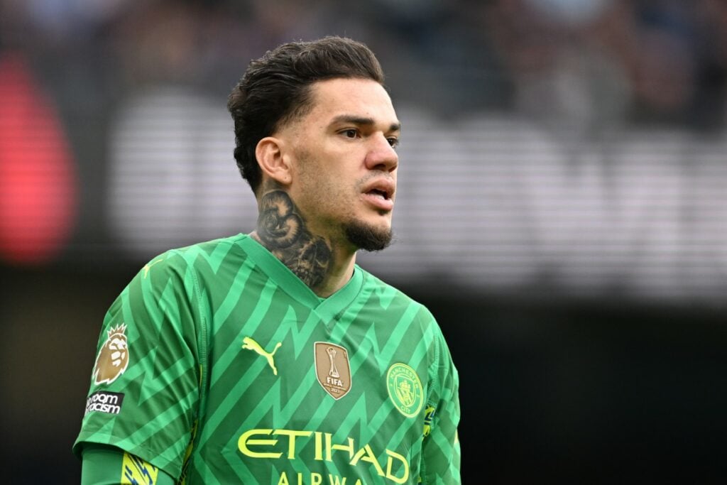 Man City goalkeeper Ederson in action