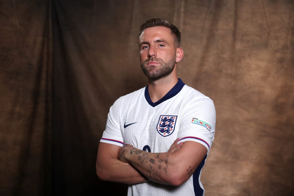 Man United's Luke Shaw representing England during a photo shoot, with his arms crossed