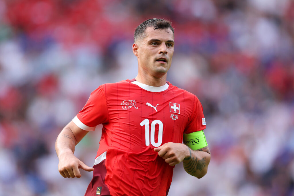Granit Xhaka of Switzerland looks on during the UEFA EURO 2024 round of 16 match between Switzerland and Italy at Olympiastadion on June 29, 2024 i...