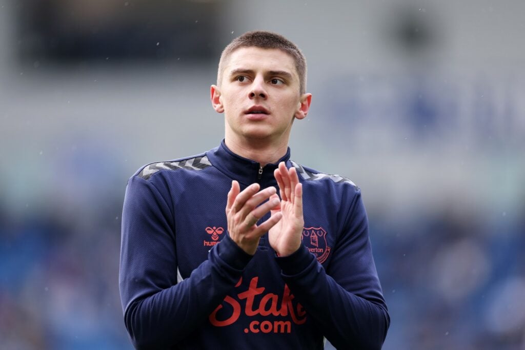 Everton defender Vitaliy Mykolenko clapping the supporters.