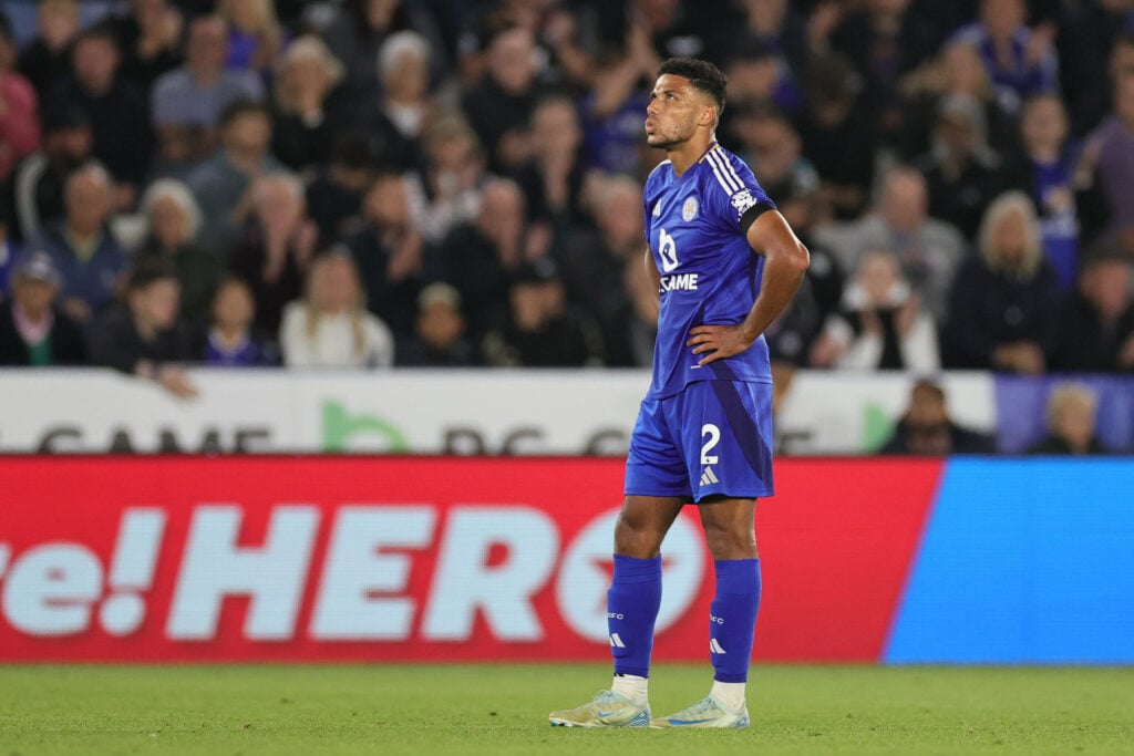 Leicester City defender James Justin looks on dejectedly.