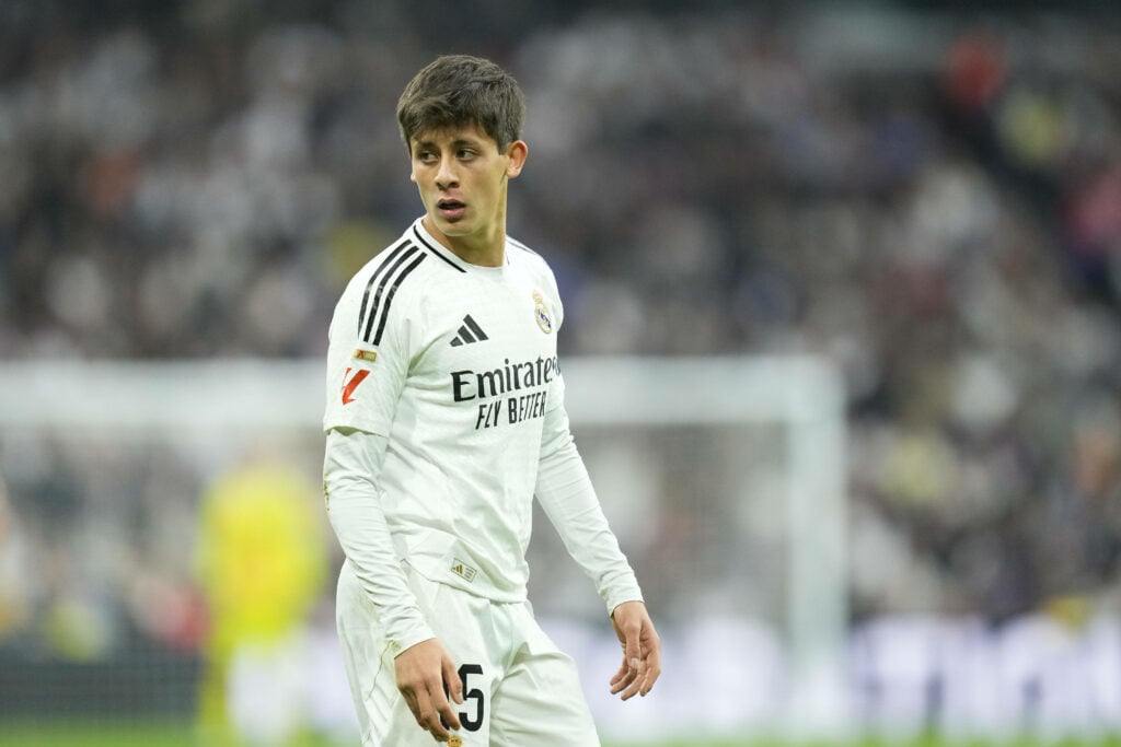 Arda Guler looking focused in a Real Madrid shirt