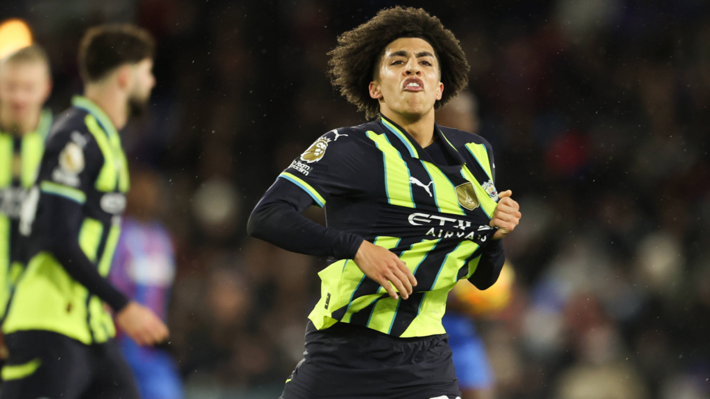 Rico Lewis celebrates after scoring a goal for Man City