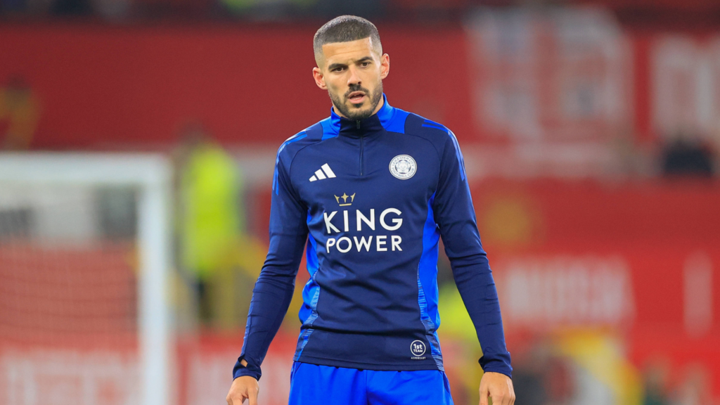 Conor Coady warming up for Leicester City at Old Trafford.