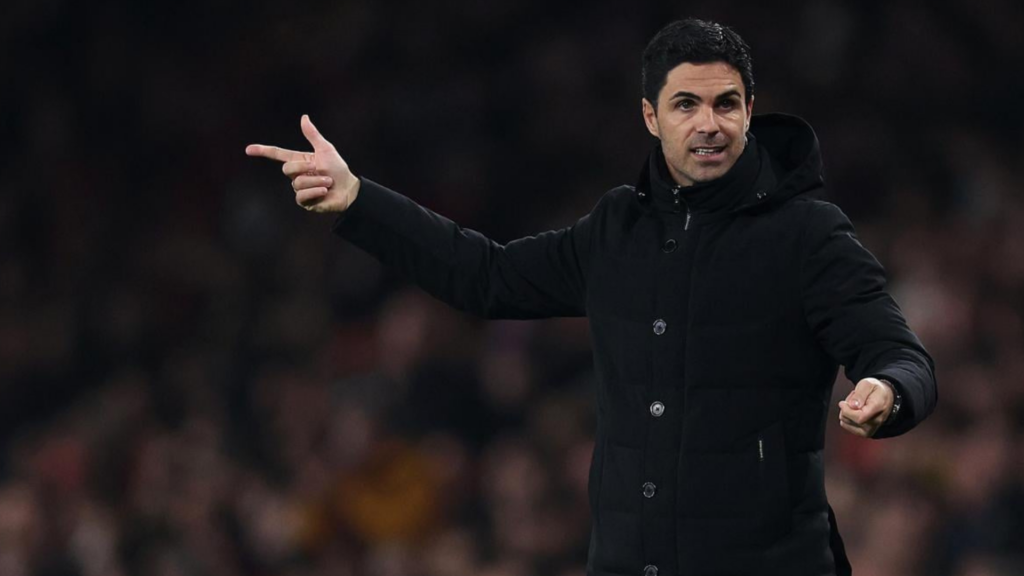 Mikel Arteta managing Arsenal on the side lines.