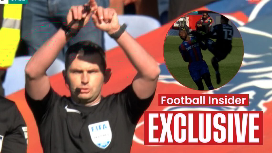 Referee Michael Oliver and Jean-Philippe Mateta