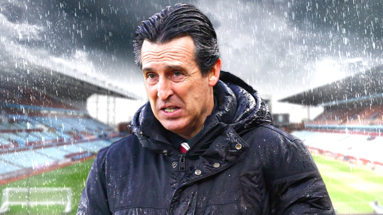 Aston Villa manager Unai Emery against a back drop of Villa Park in rainy conditions.
