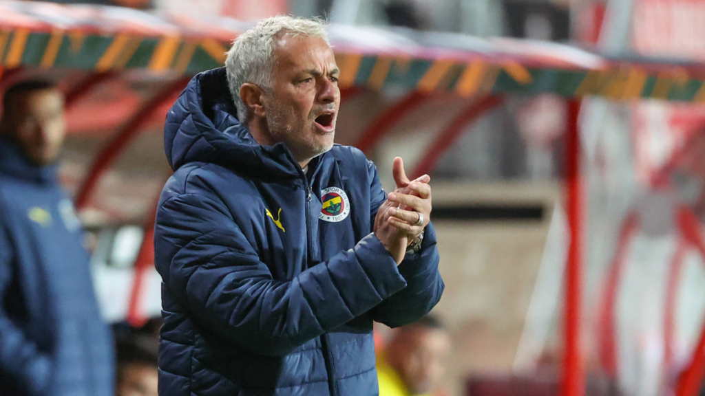 Jose Mourinho encourages his side on the touchline for Fenerbahce