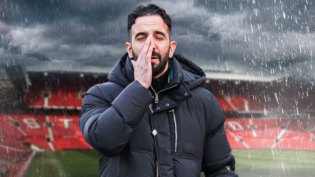 Man United manager Ruben Amorim looking sad with rain around him