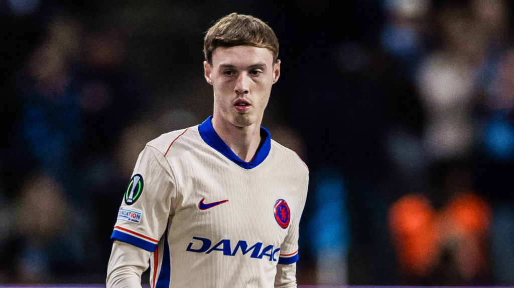 Cole Palmer wearing a Chelsea's away strip.