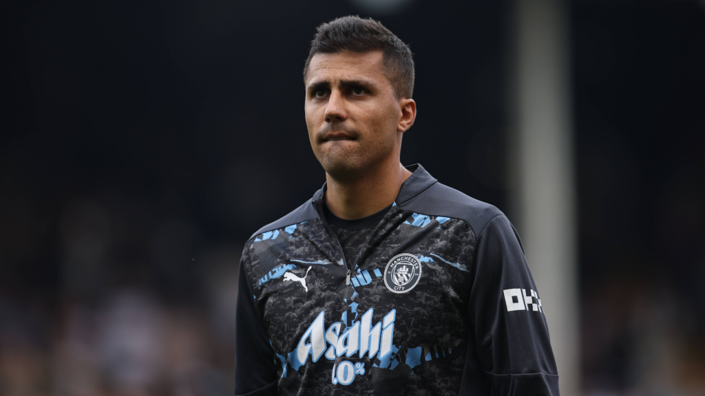 Rodri of Man City pictured warming up before a Premier League match.