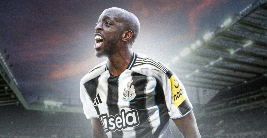 Yoane Wissa in a Newcastle United shirt against a backdrop of St James' Park.