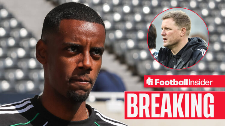 Alexander Isak and Eddie Howe walking on the pitch at St James' Park