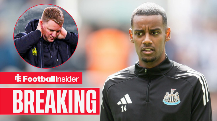 Newcastle's Alexander Isak in a training top looking confused at manager Eddie Howe who is upset