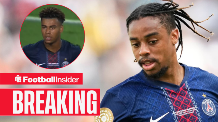 Breaking news Desire Doue looks on at PSG winger Bradley Barcola in action