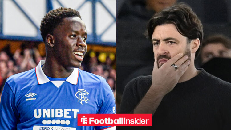 Djeidi Gassama in a blue Rangers shirt smiling looking at a concerned Russell Martin holding his hand to his face on the right