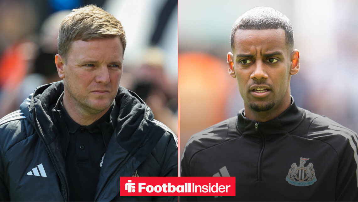 Eddie Howe looking at Alexander Isak in Newcastle United training jacket