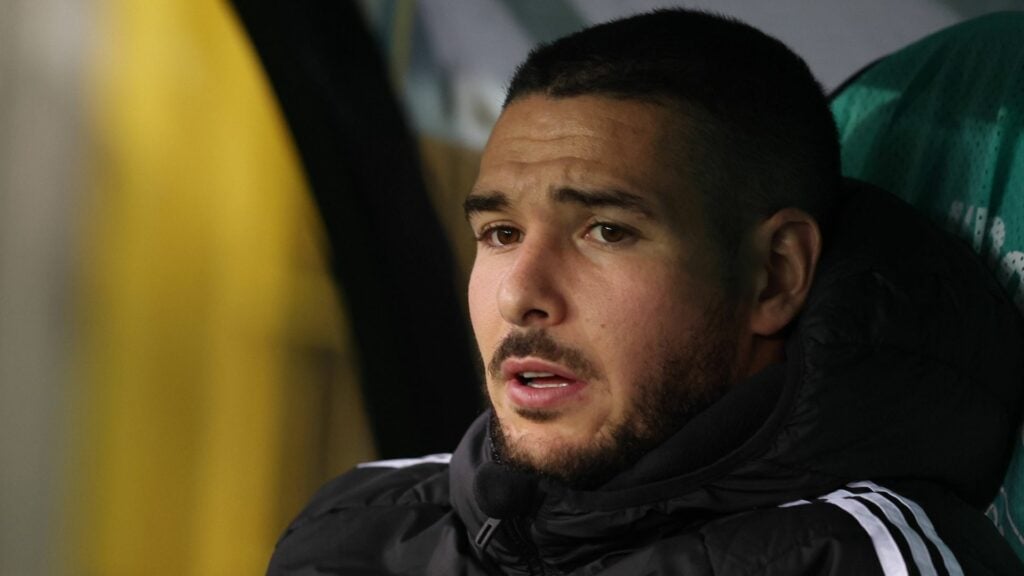 Emi Buendia sits on the Aston Villa bench