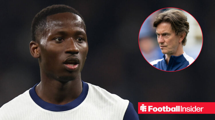 Tottenham midfielder Pape Sarr looks at manager Thomas Frank
