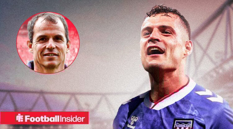 Granit Xhaka in the Sunderland away kit alongside manager Regis Le Bris.