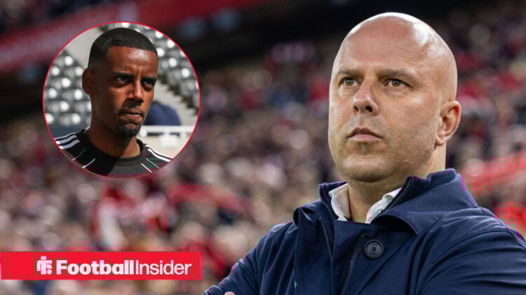 Newcastle striker Alexander Isak looks across at Liverpool manager Arne Slot