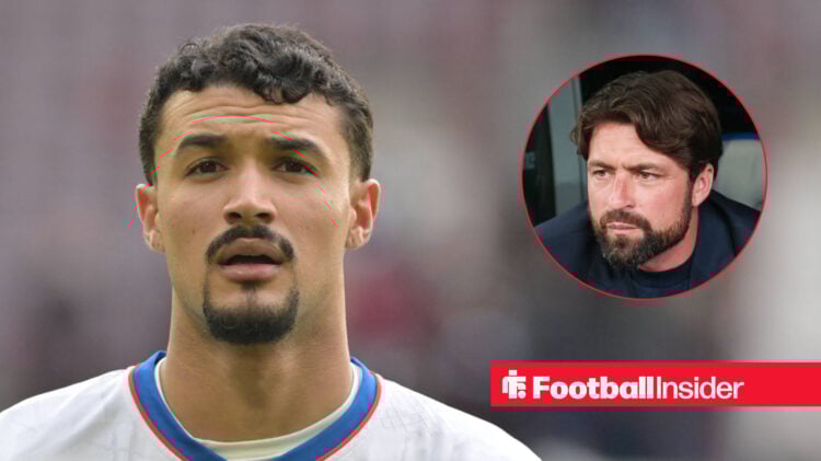 Rangers defender Jefte looks on, next to an image of manager Russell Martin.