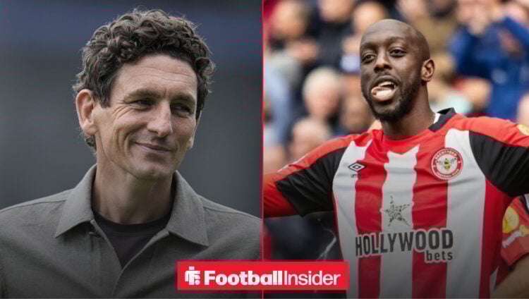 Keith Andrews looking to the right next to Yoane Wissa celebrating a goal