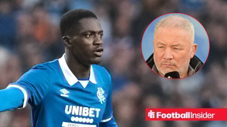 Nasser Djiga on the left in a blue Rangers shirt looking focused with Ally McCoist on the right looking serious