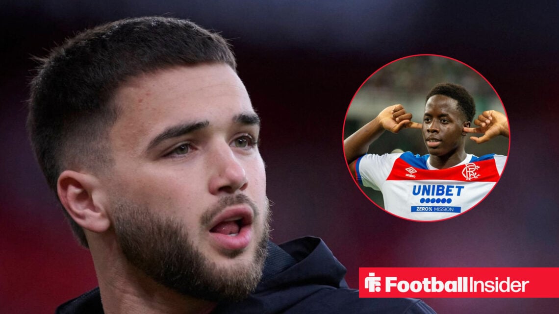 Nico Raskin with mouth open looks at Djeidi Gassama with his fingers in his ears