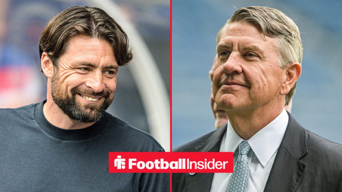 Russell Martin smiling in the Ibrox dugout alongside Andrew Cavenagh